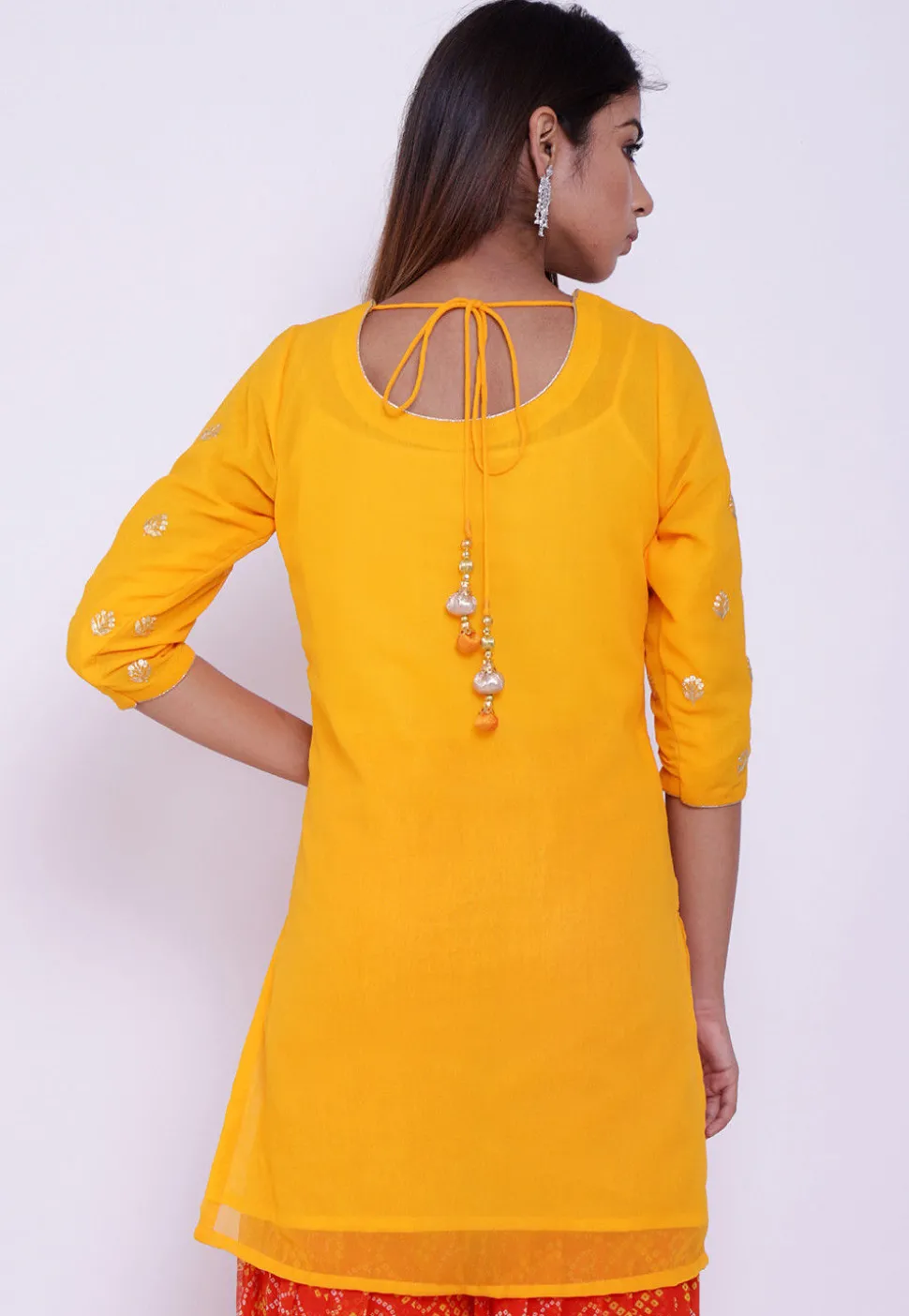 Embroidered Georgette Straight Kurti in Yellow