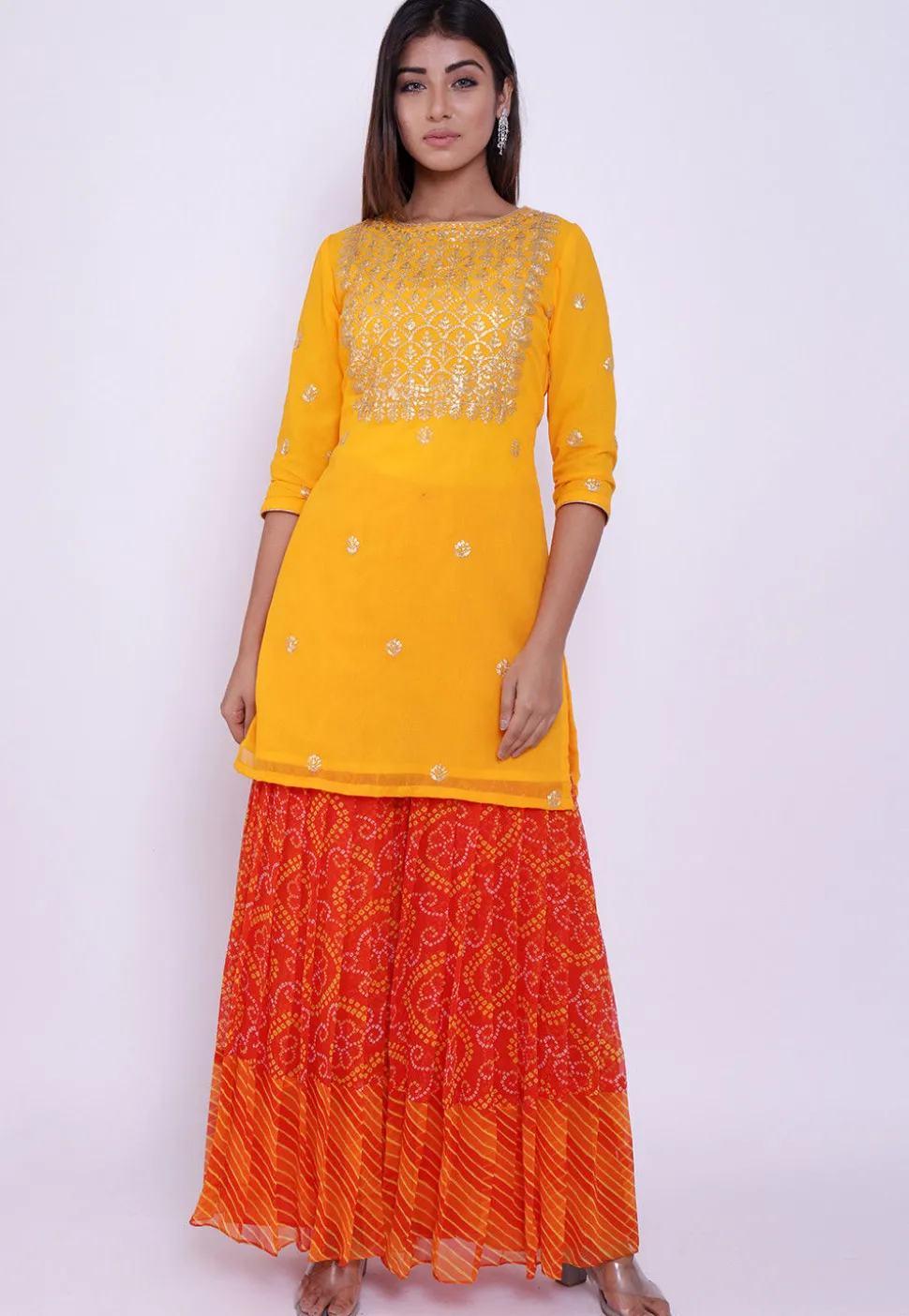 Embroidered Georgette Straight Kurti in Yellow