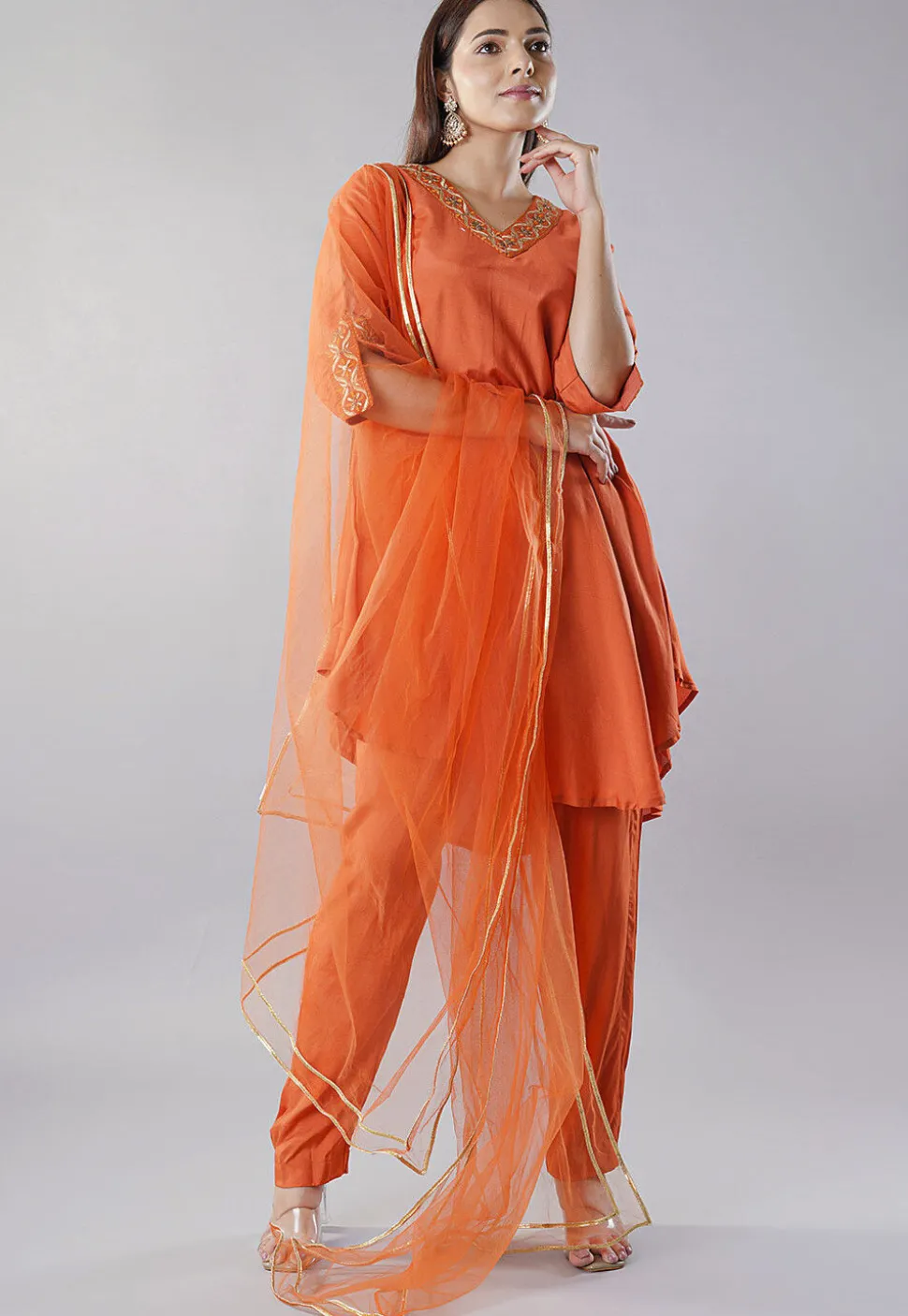 Embroidered Muslin Silk Pakistani Suit in Rust