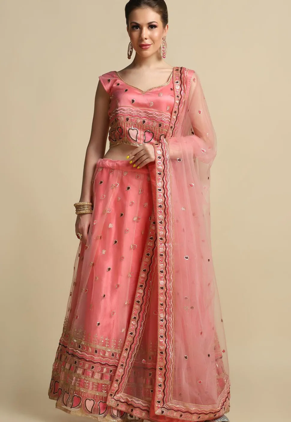 Embroidered Net Lehenga in Peach