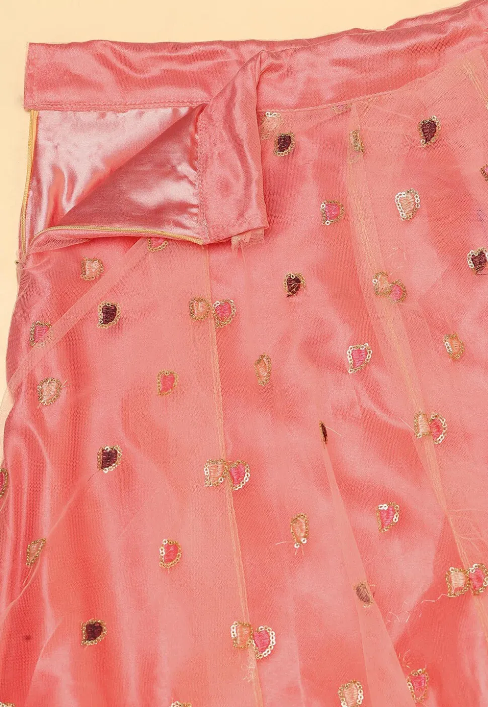 Embroidered Net Lehenga in Peach