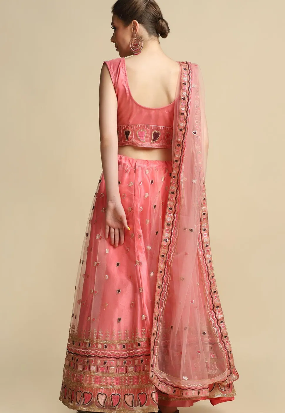 Embroidered Net Lehenga in Peach