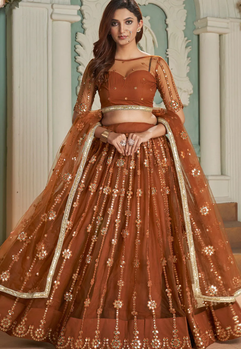 Embroidered Net Lehenga in Rust