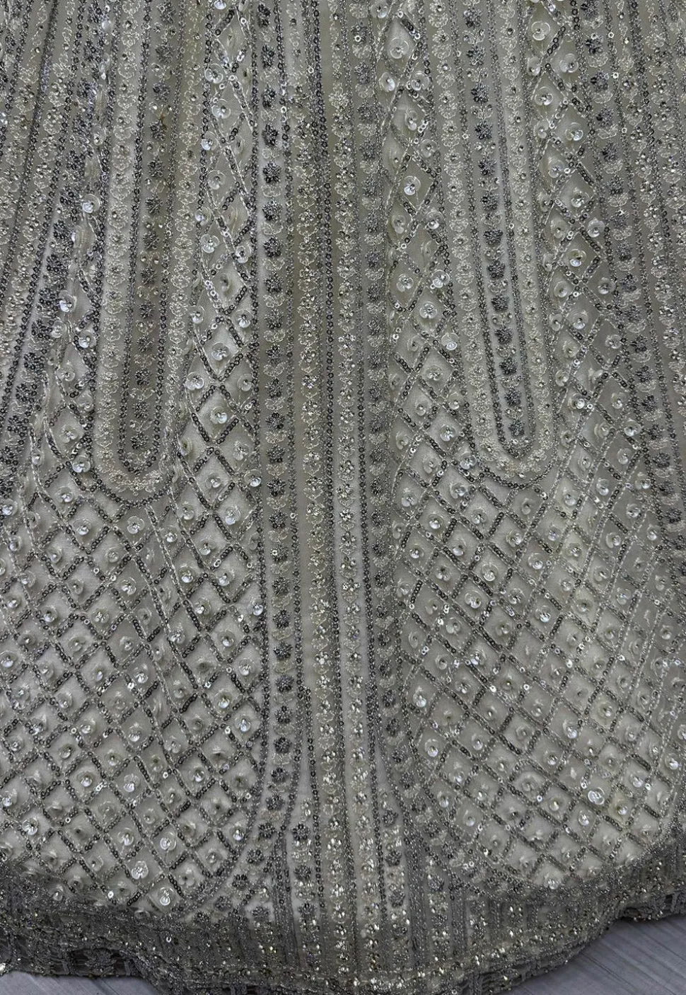 Embroidered Net Lehenga in Off White