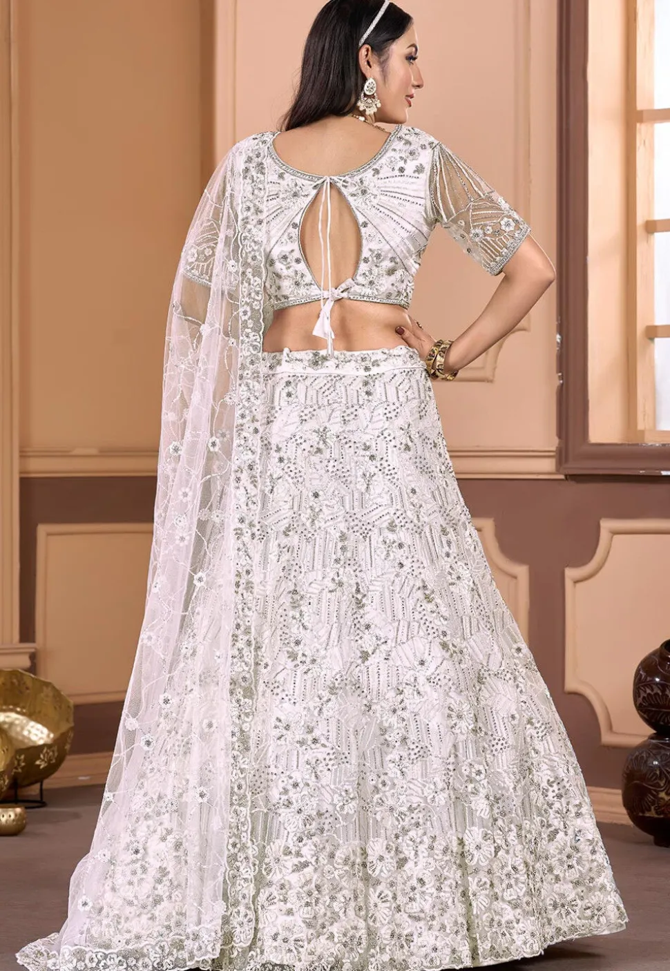 Embroidered Net Lehenga in Off White
