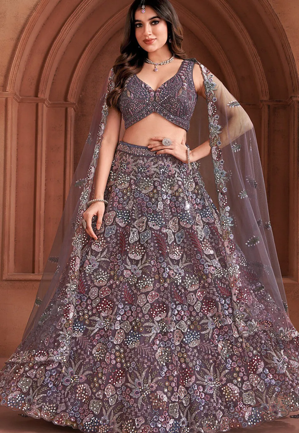 Embroidered Net Lehenga in Purple
