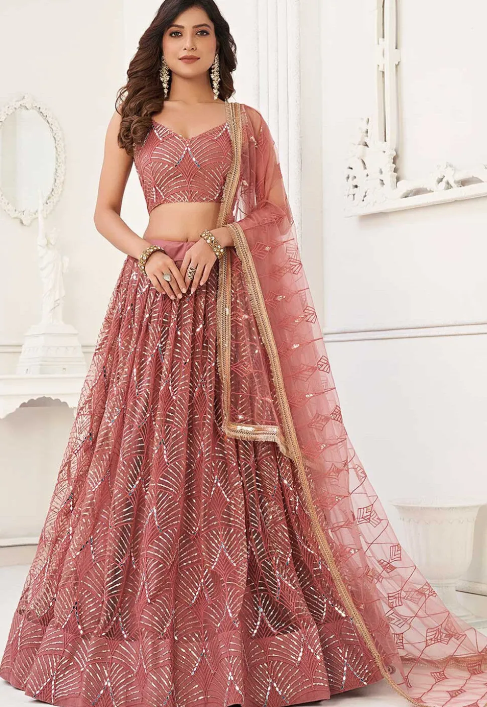 Embroidered Net Lehenga in Peach