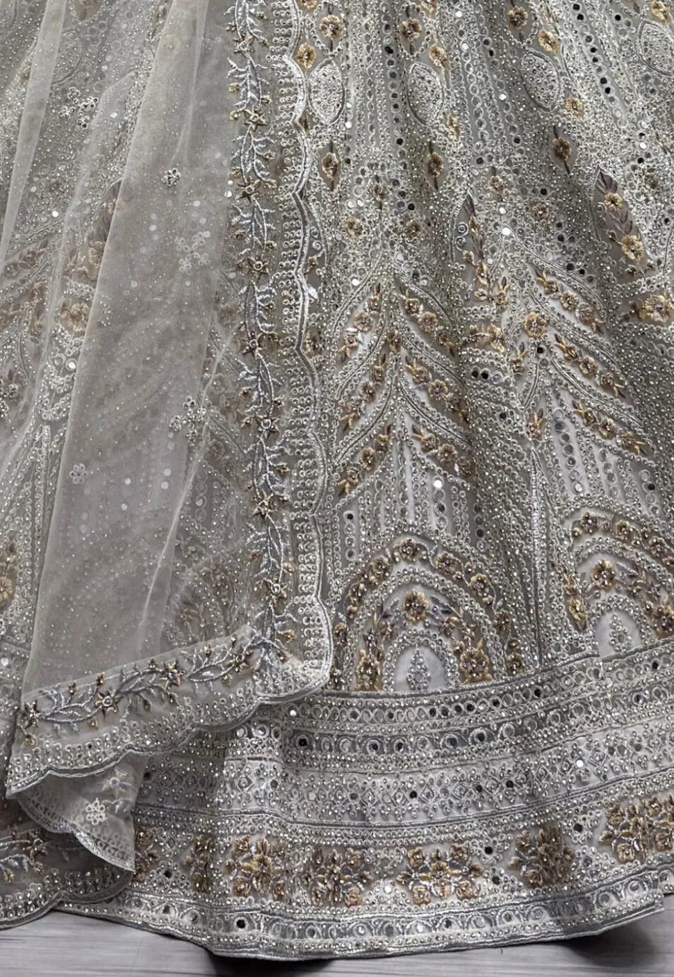 Embroidered Net Lehenga in Off White