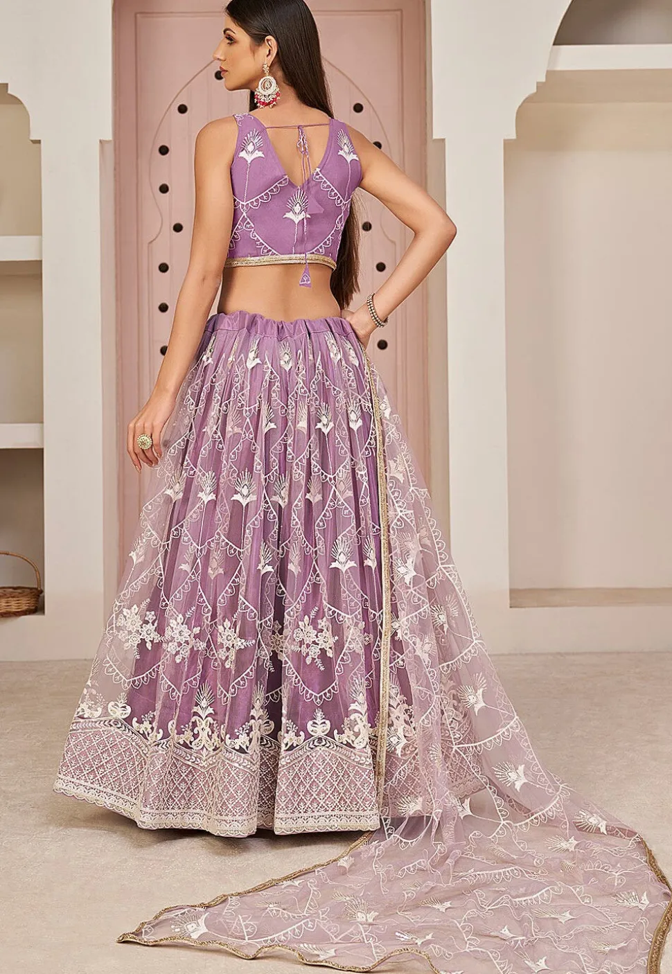 Embroidered Net Lehenga in Purple