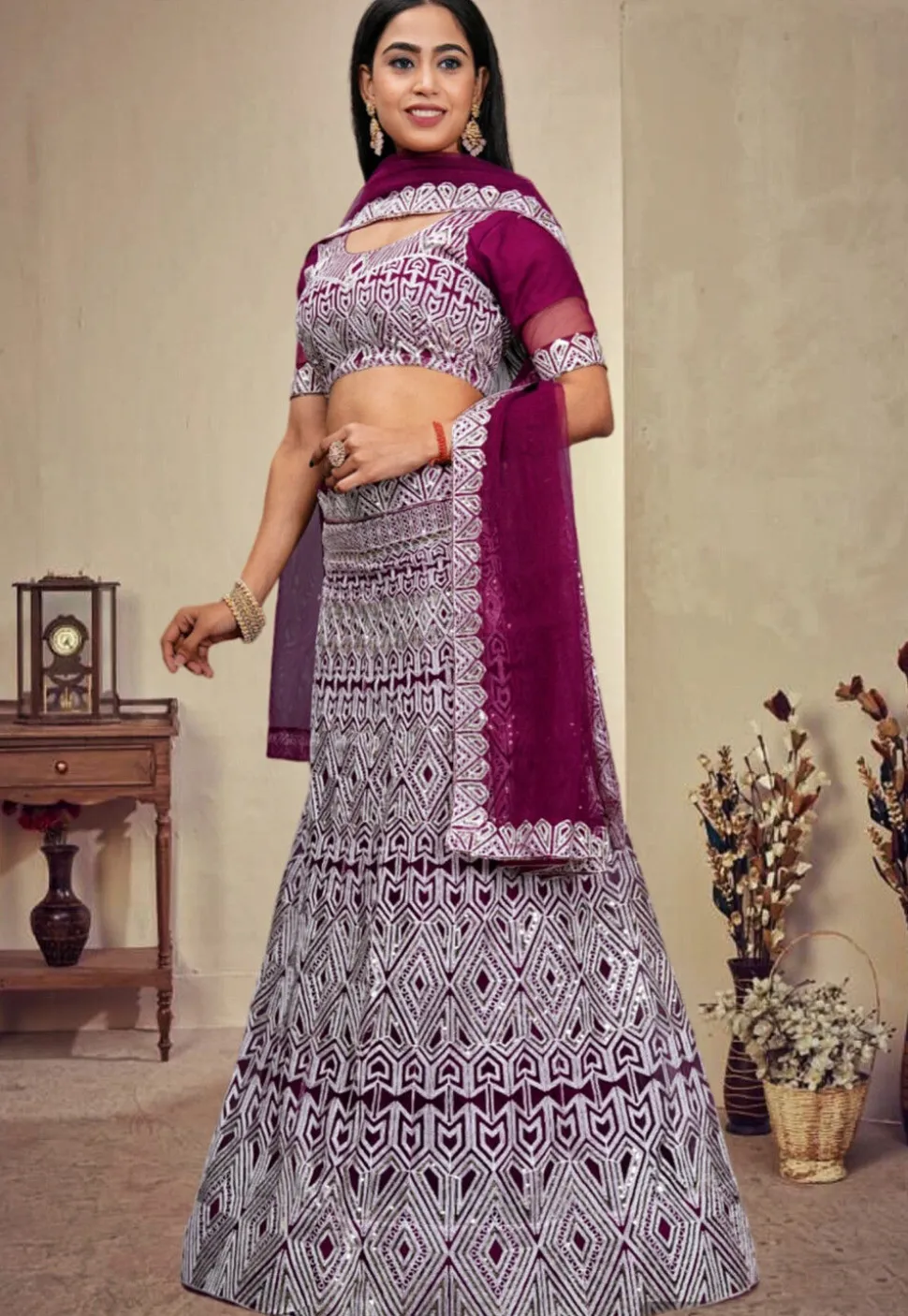 Embroidered Net Lehenga in Wine