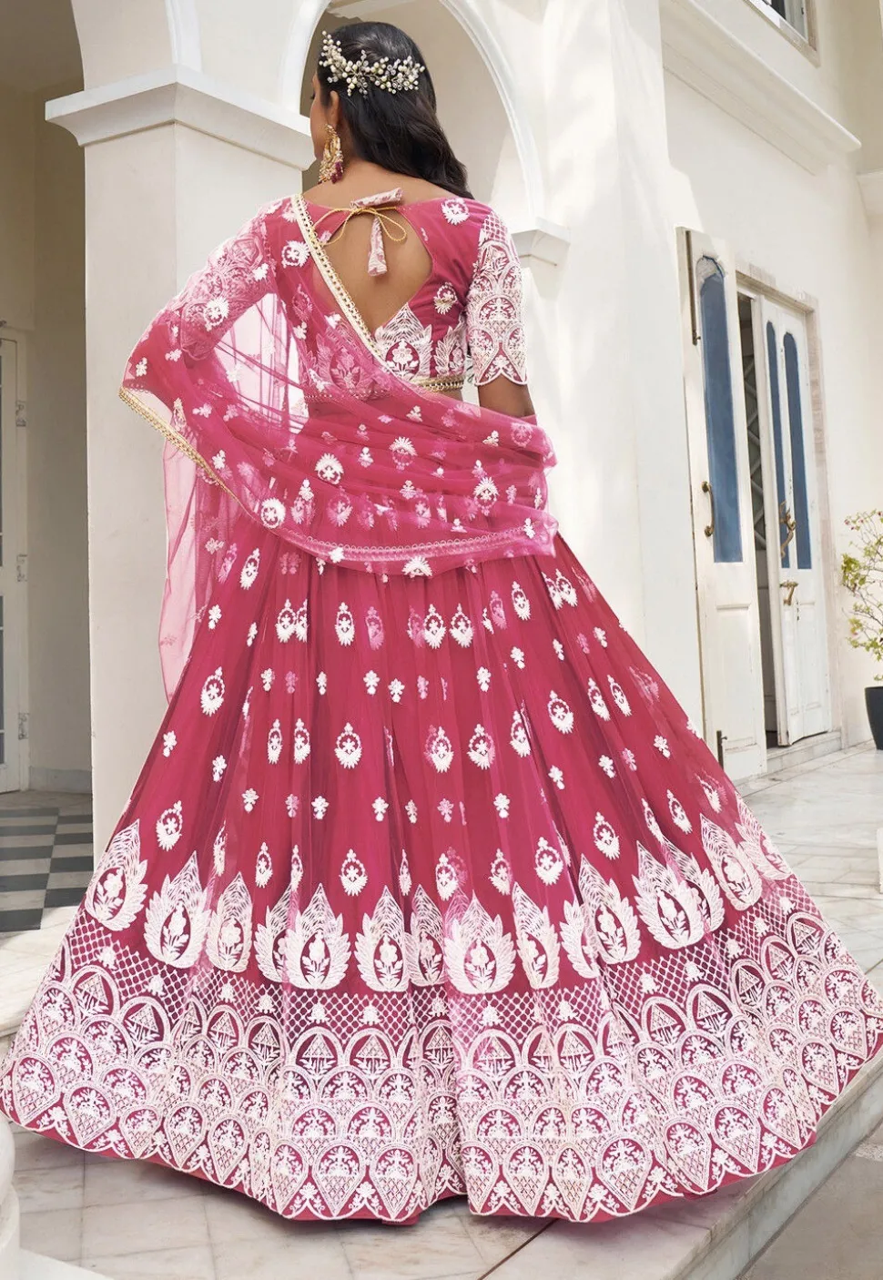 Embroidered Net Lehenga in Magenta
