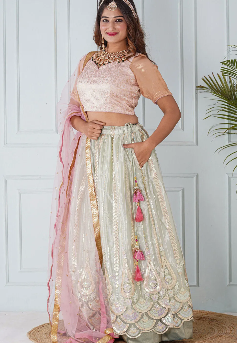 Embroidered Net Lehenga in Pastel Green
