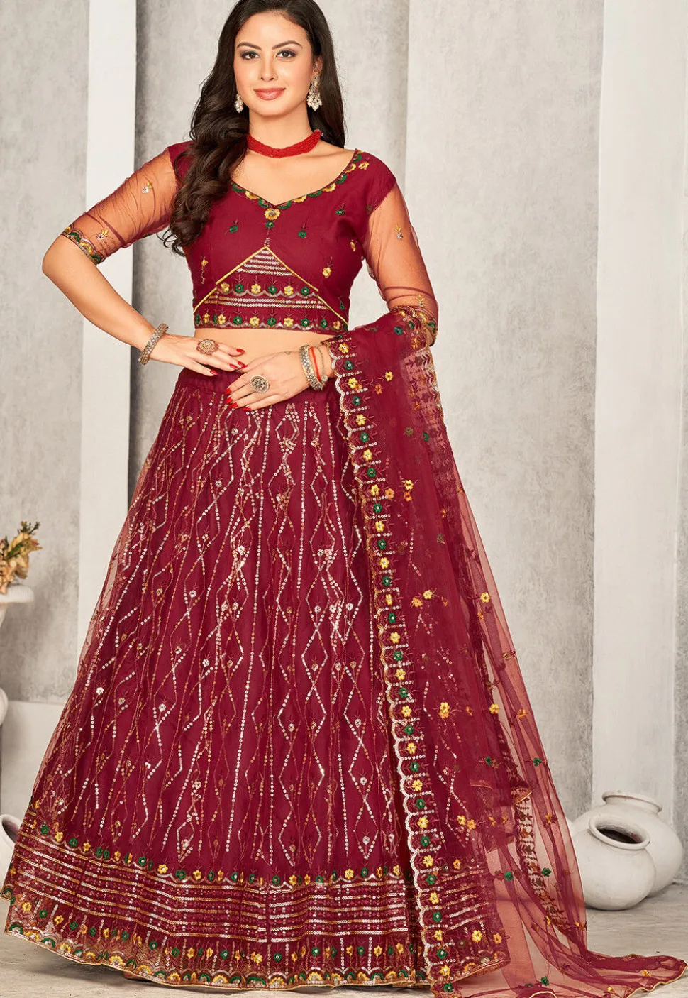 Embroidered Net Lehenga in Maroon