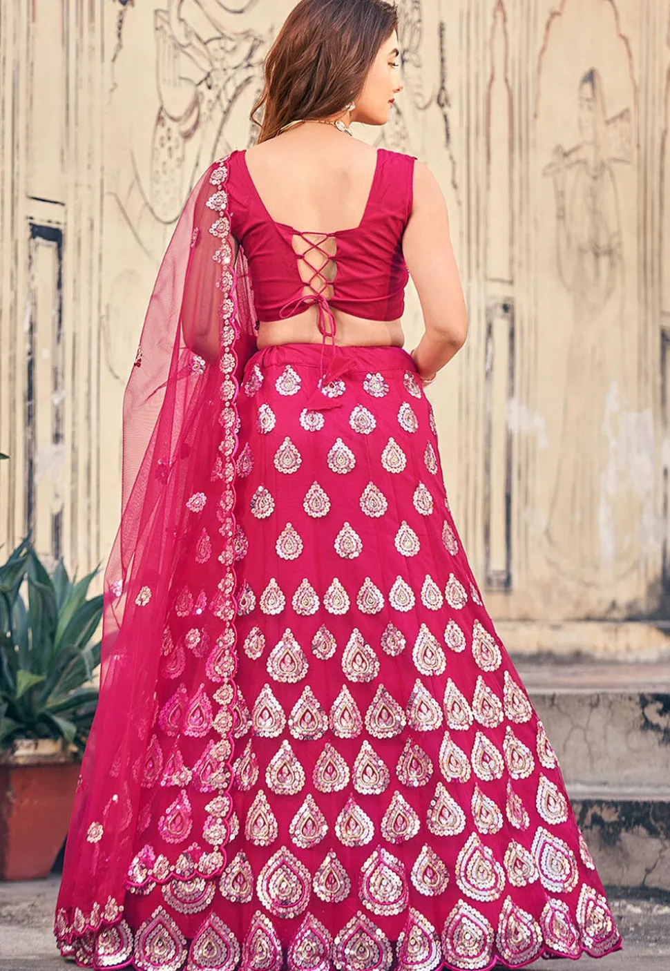 Embroidered Net Lehenga in Fuchsia