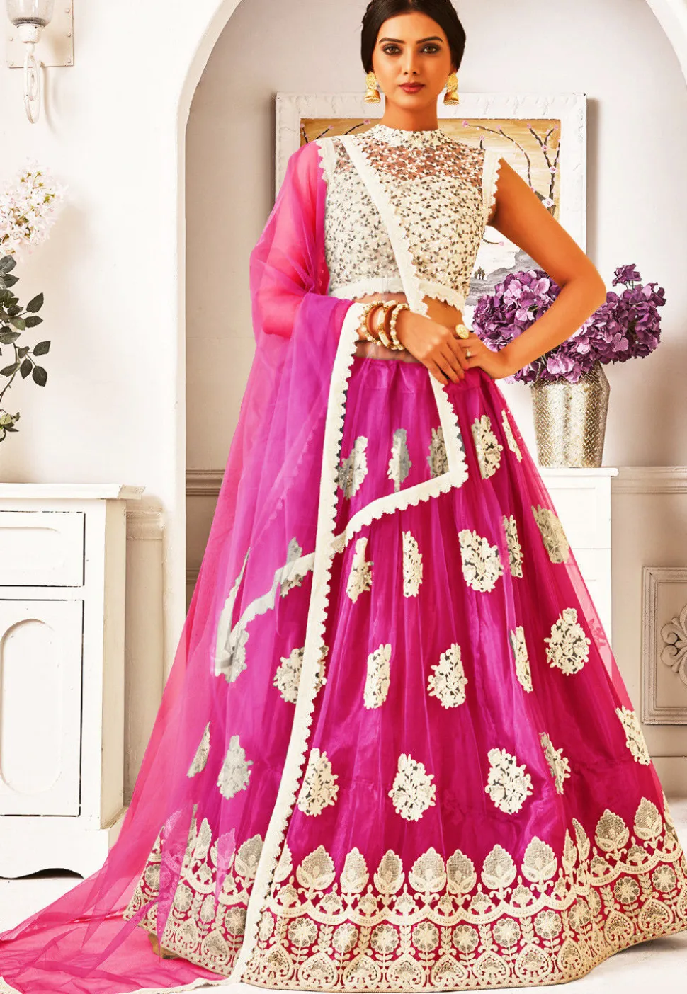Embroidered Net Lehenga in Fuchsia