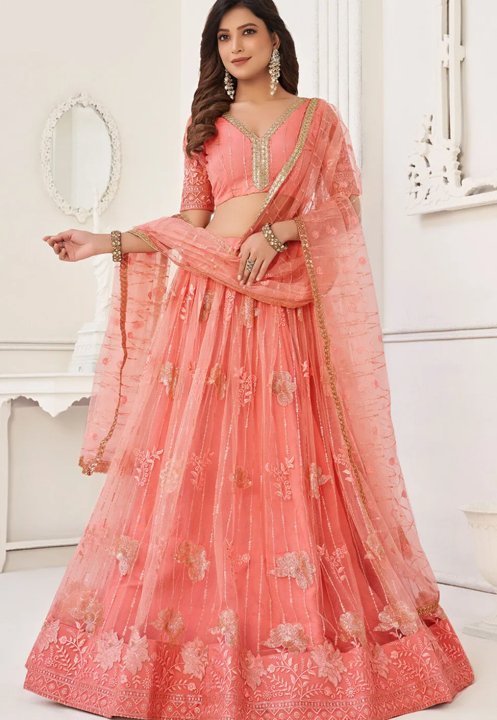 Embroidered Net Lehenga in Peach