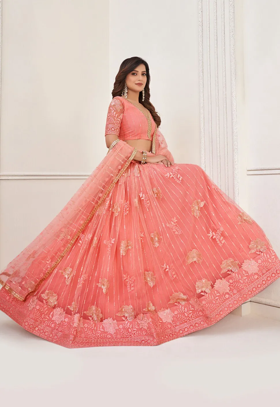 Embroidered Net Lehenga in Peach