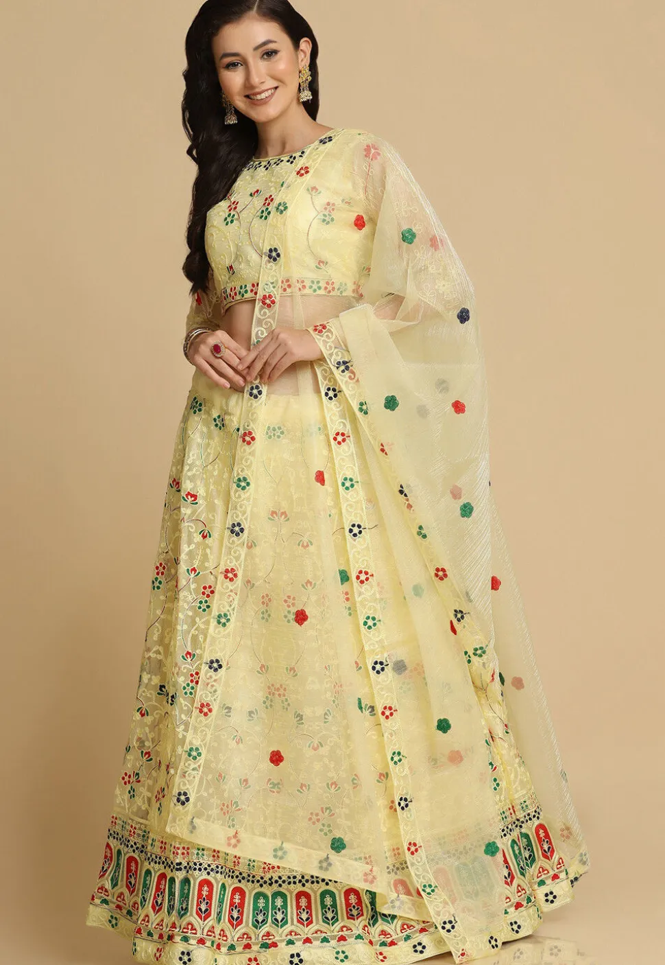 Embroidered Net Lehenga in Light Yellow