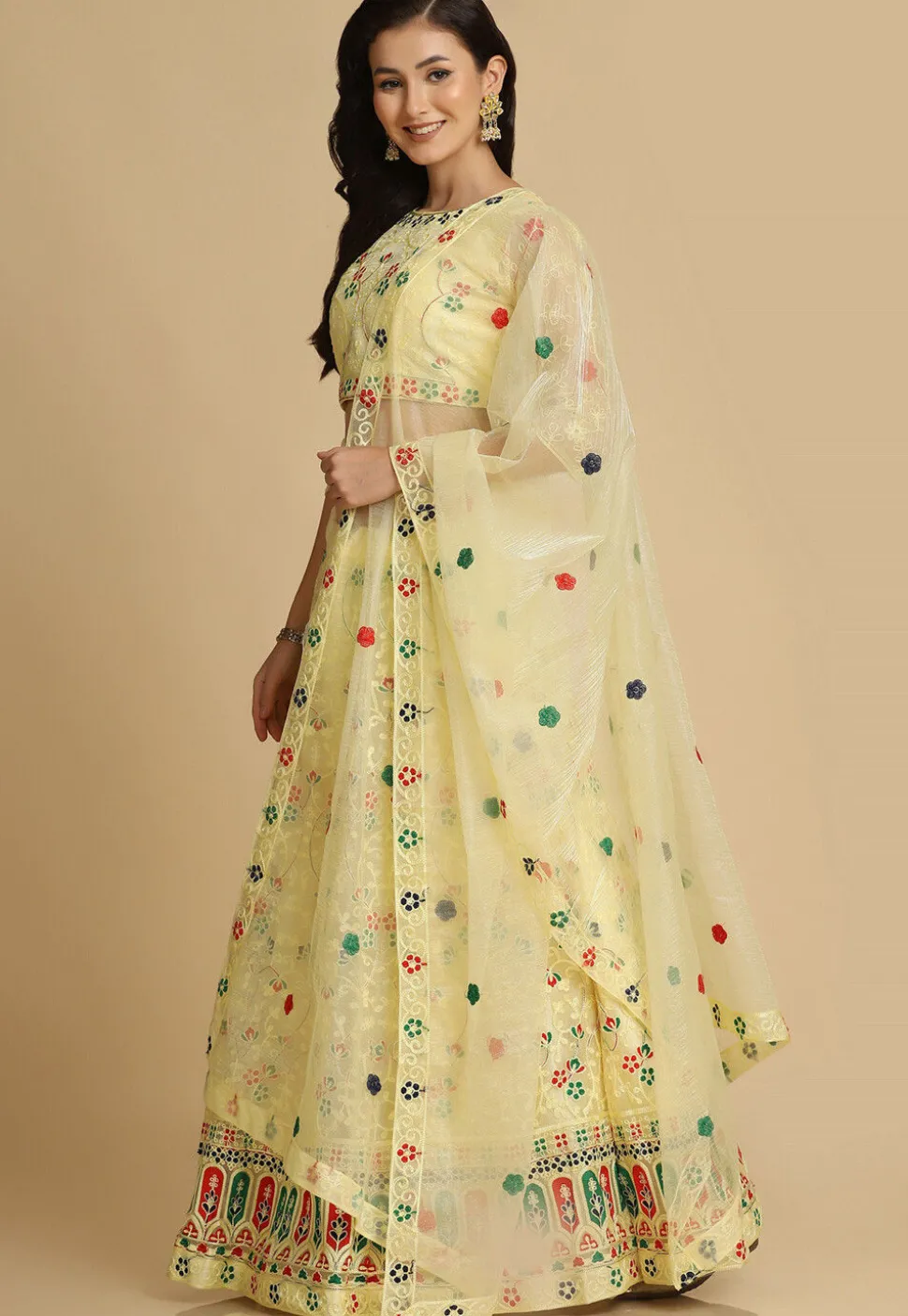 Embroidered Net Lehenga in Light Yellow
