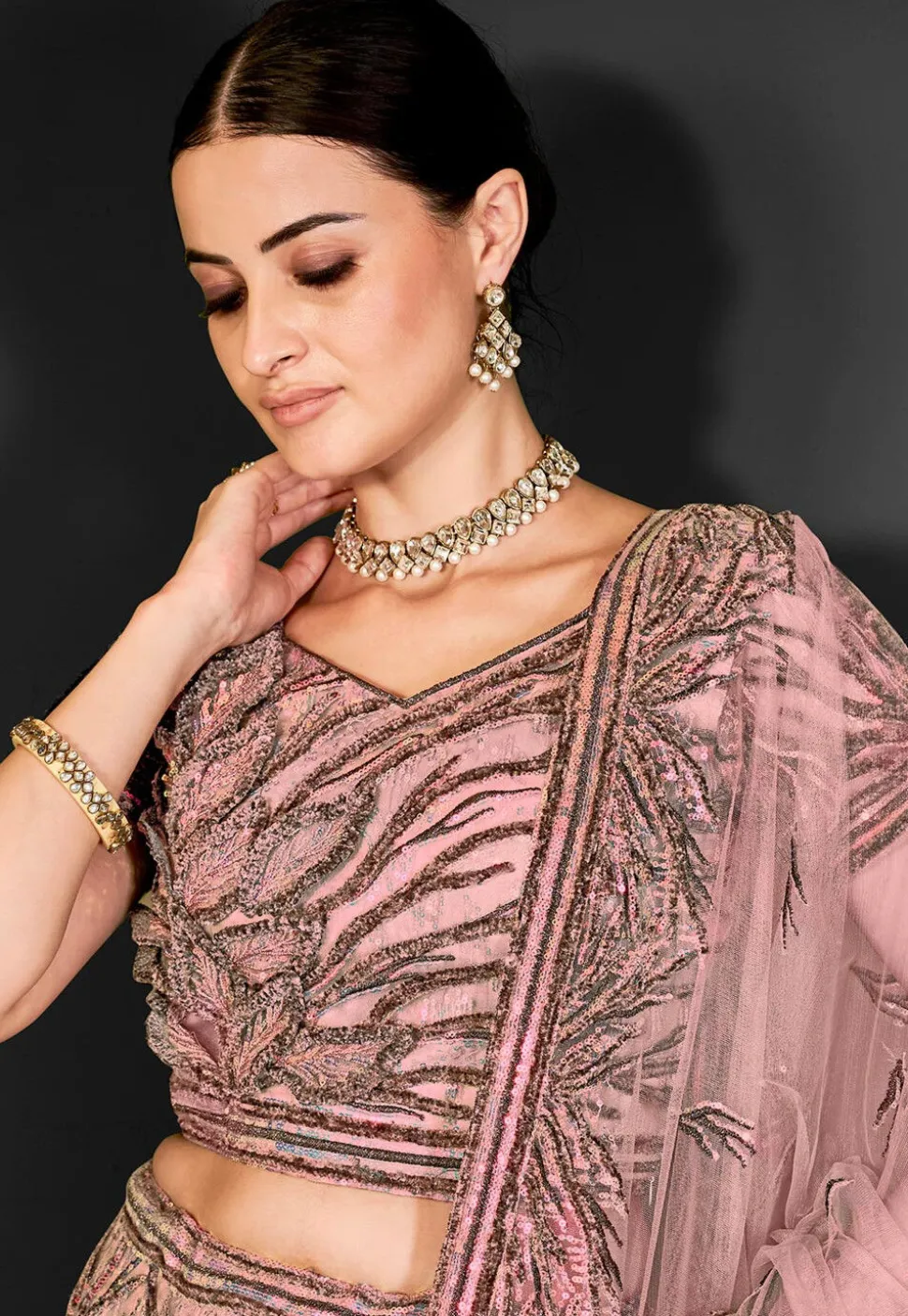 Embroidered Net Lehenga in Peach
