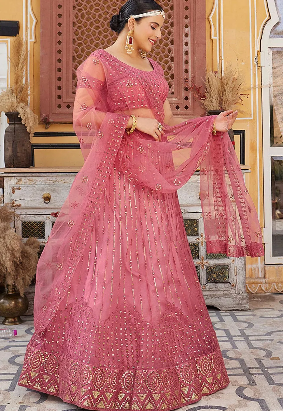 Embroidered Net Lehenga in Pink