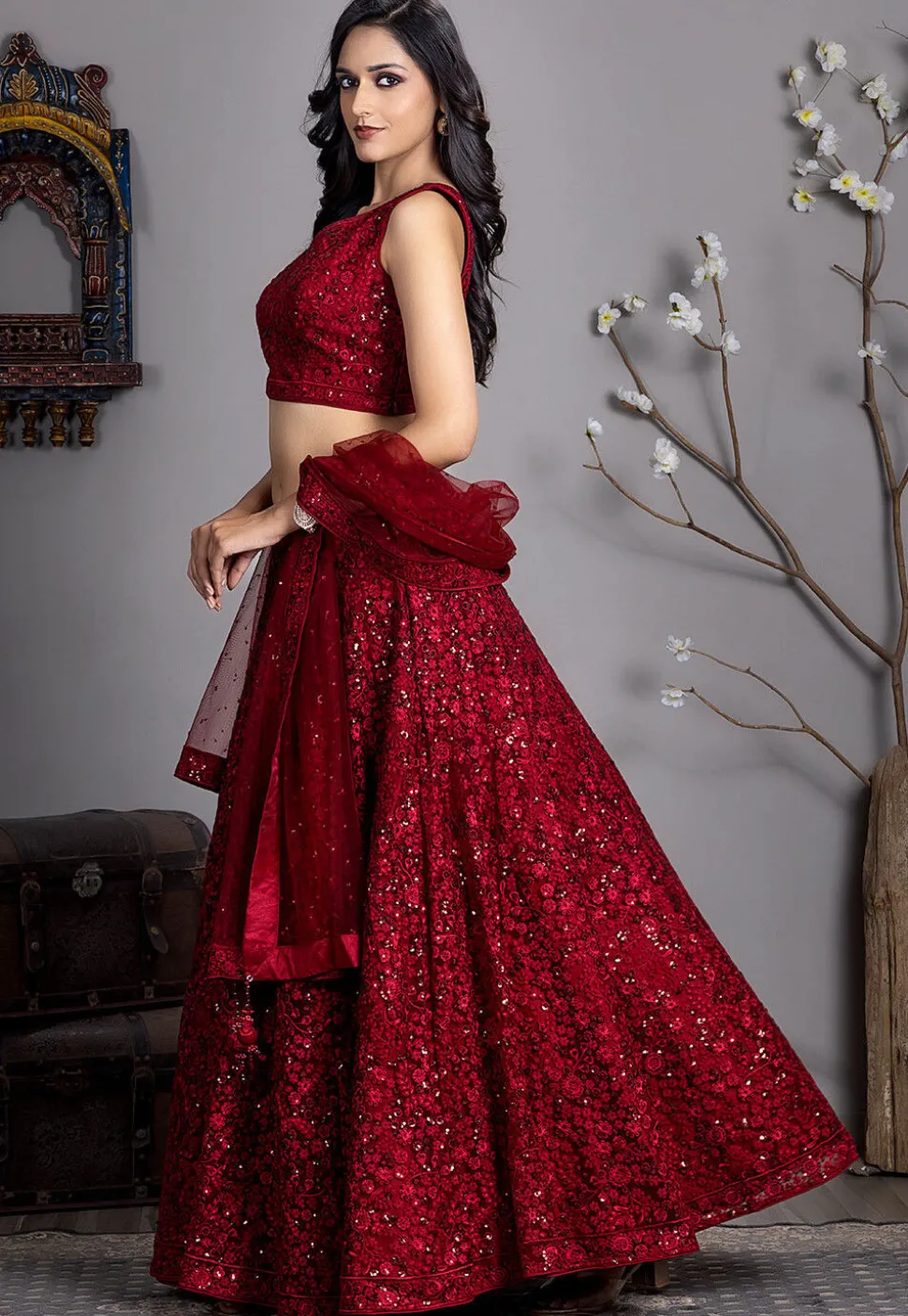 Embroidered Net Lehenga in Maroon