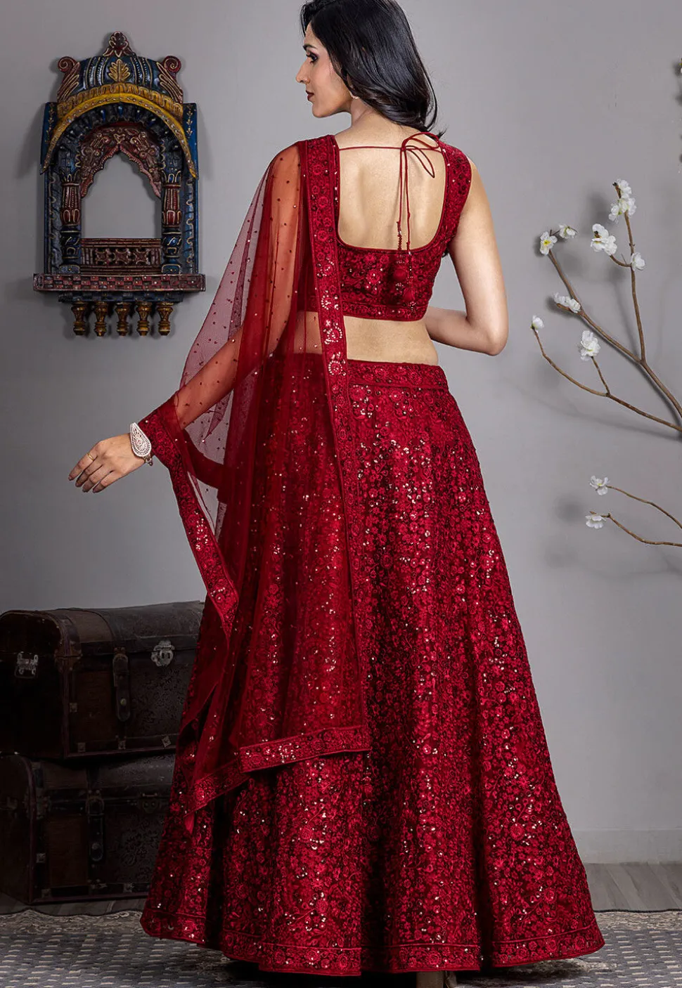 Embroidered Net Lehenga in Maroon