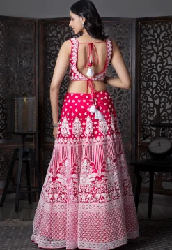 Embroidered Net Lehenga in Fuchsia
