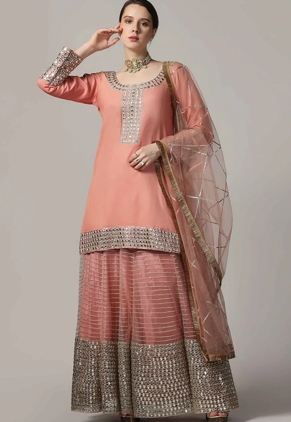 Embroidered Net Lehenga in Peach