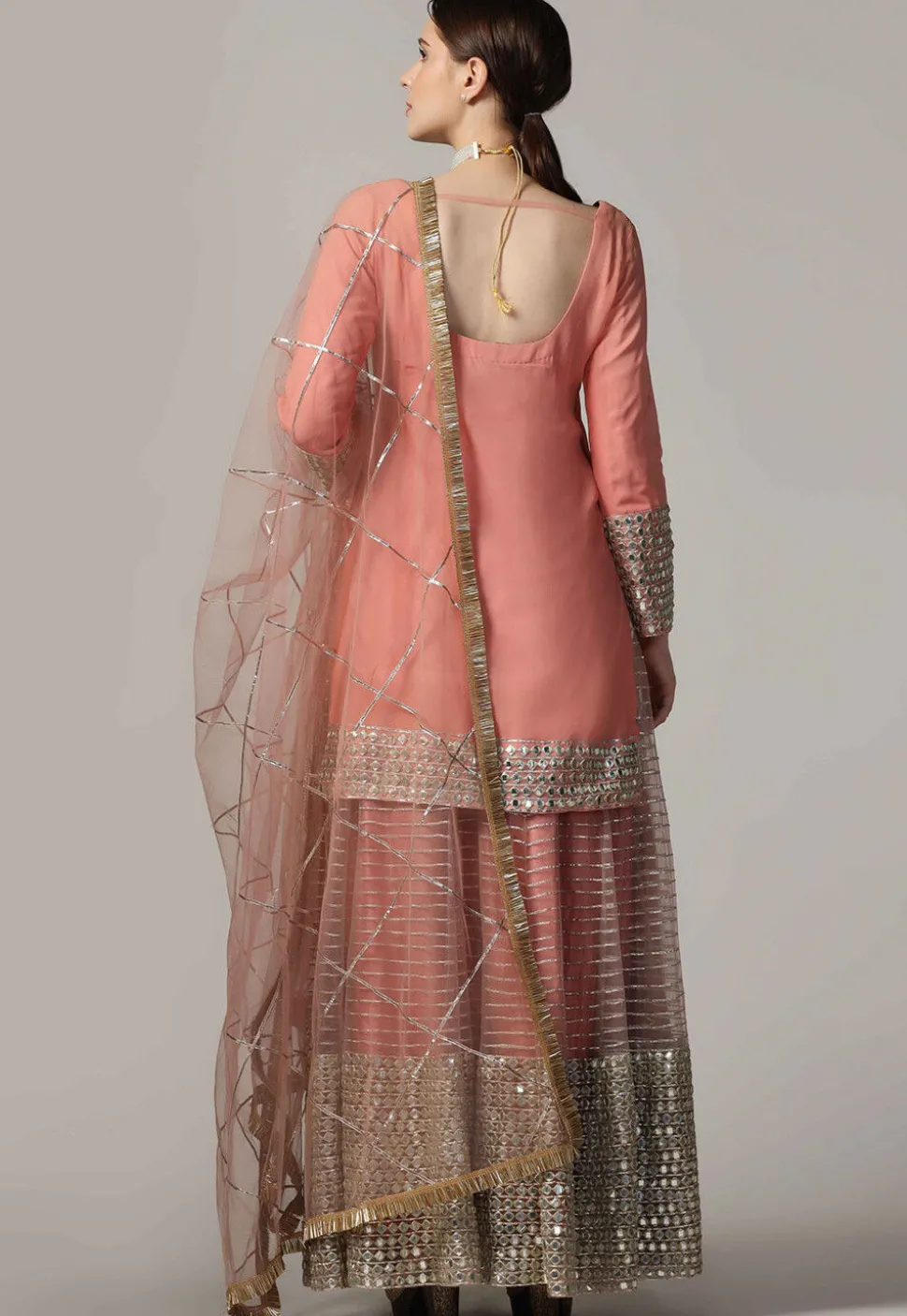Embroidered Net Lehenga in Peach