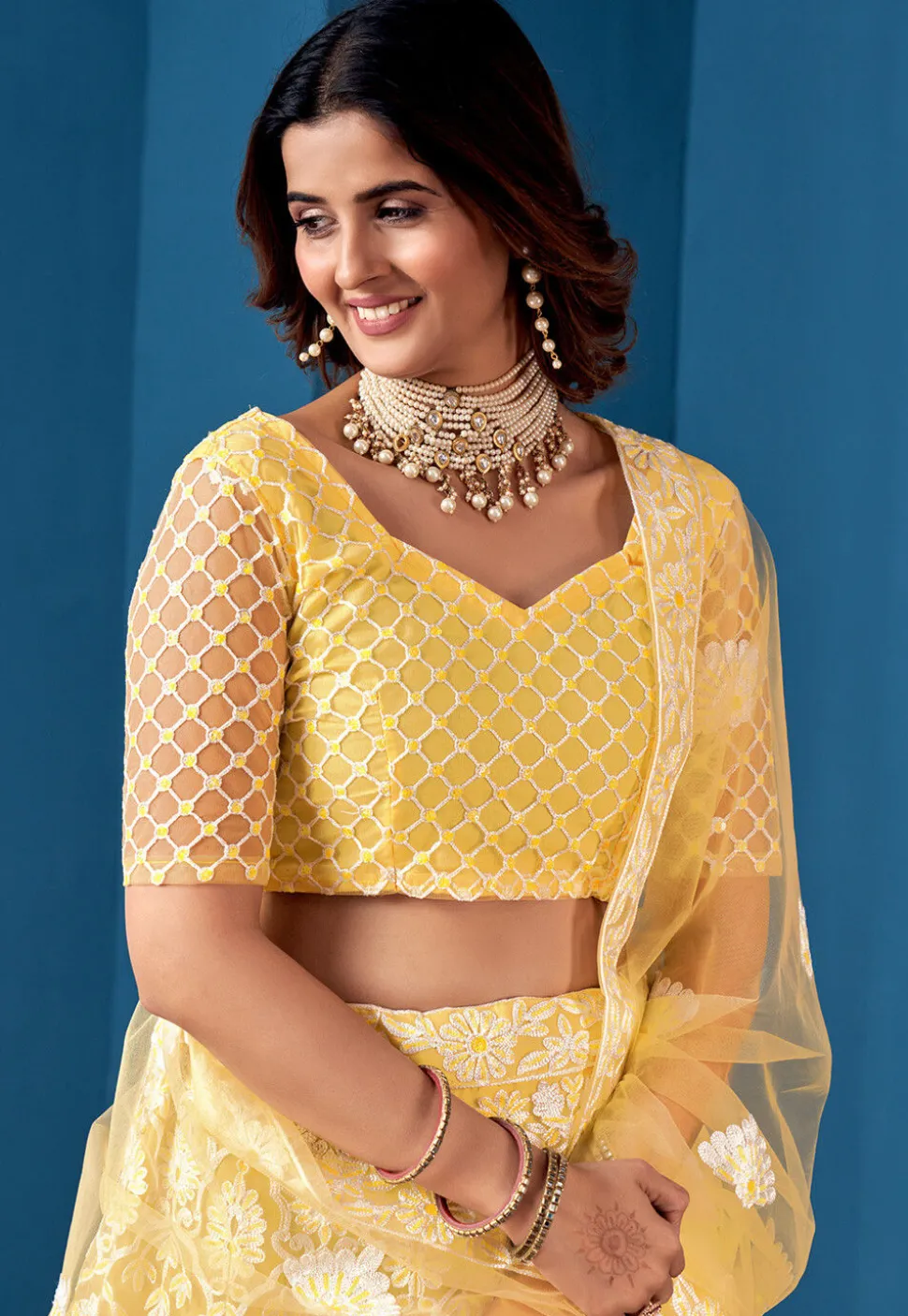Embroidered Net Lehenga Yellow