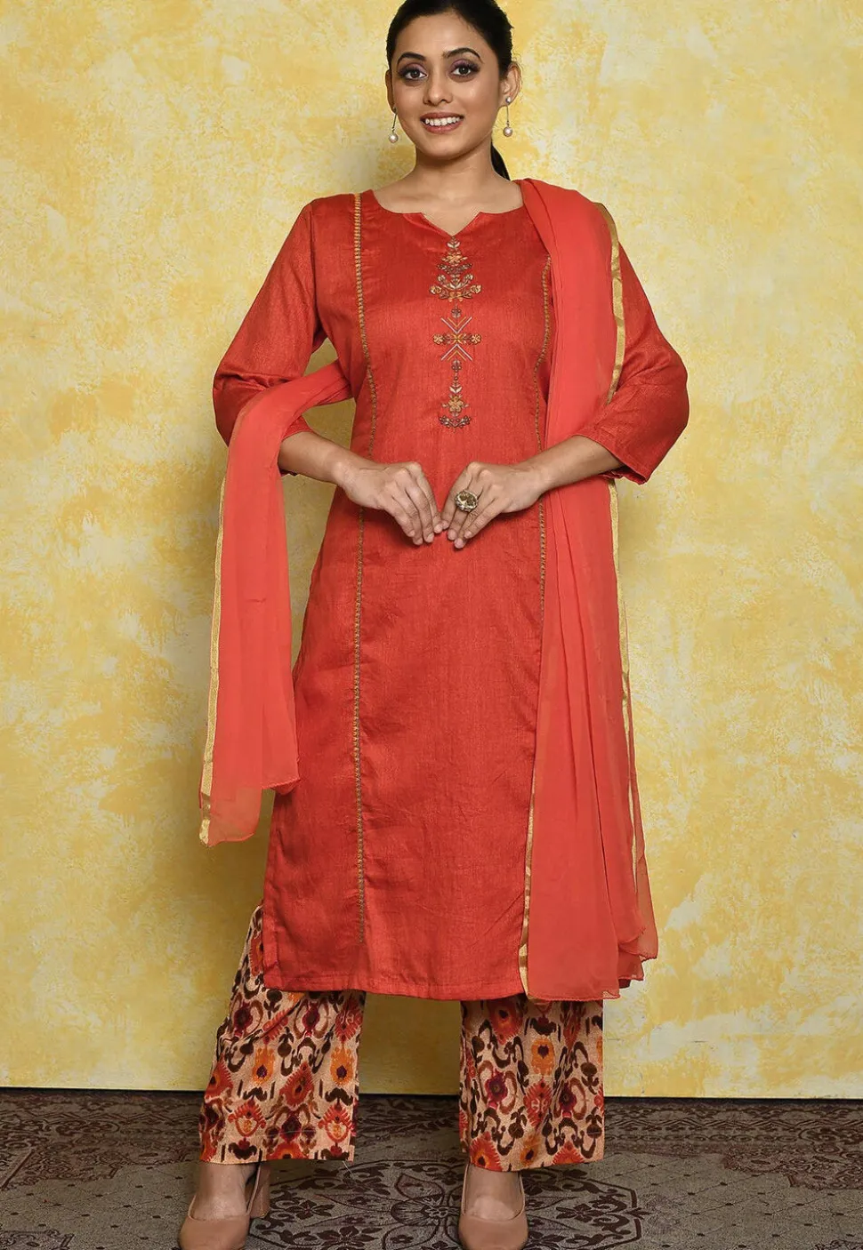 Embroidered Rayon Pakistani Suit in Orange