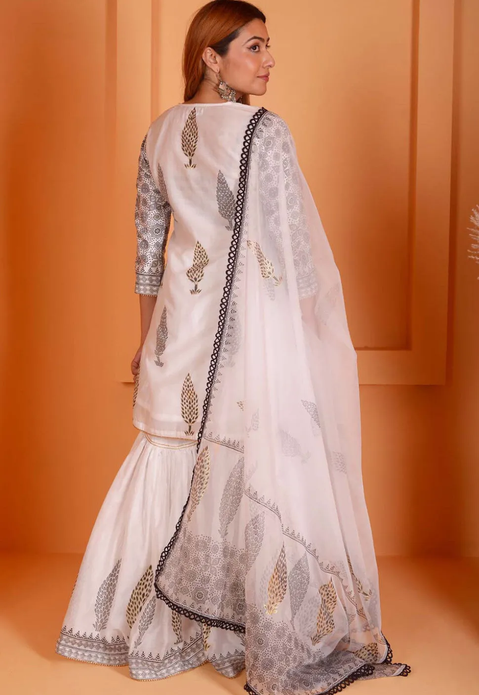 Foil Printed Chanderi Silk Pakistani Suit in Off White