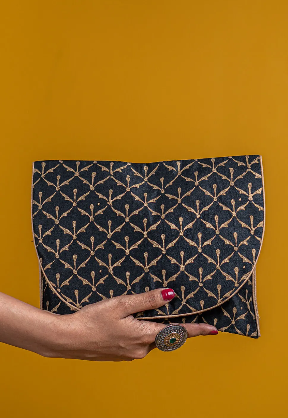 Golden Printed Art Silk Clutch Bag in Black