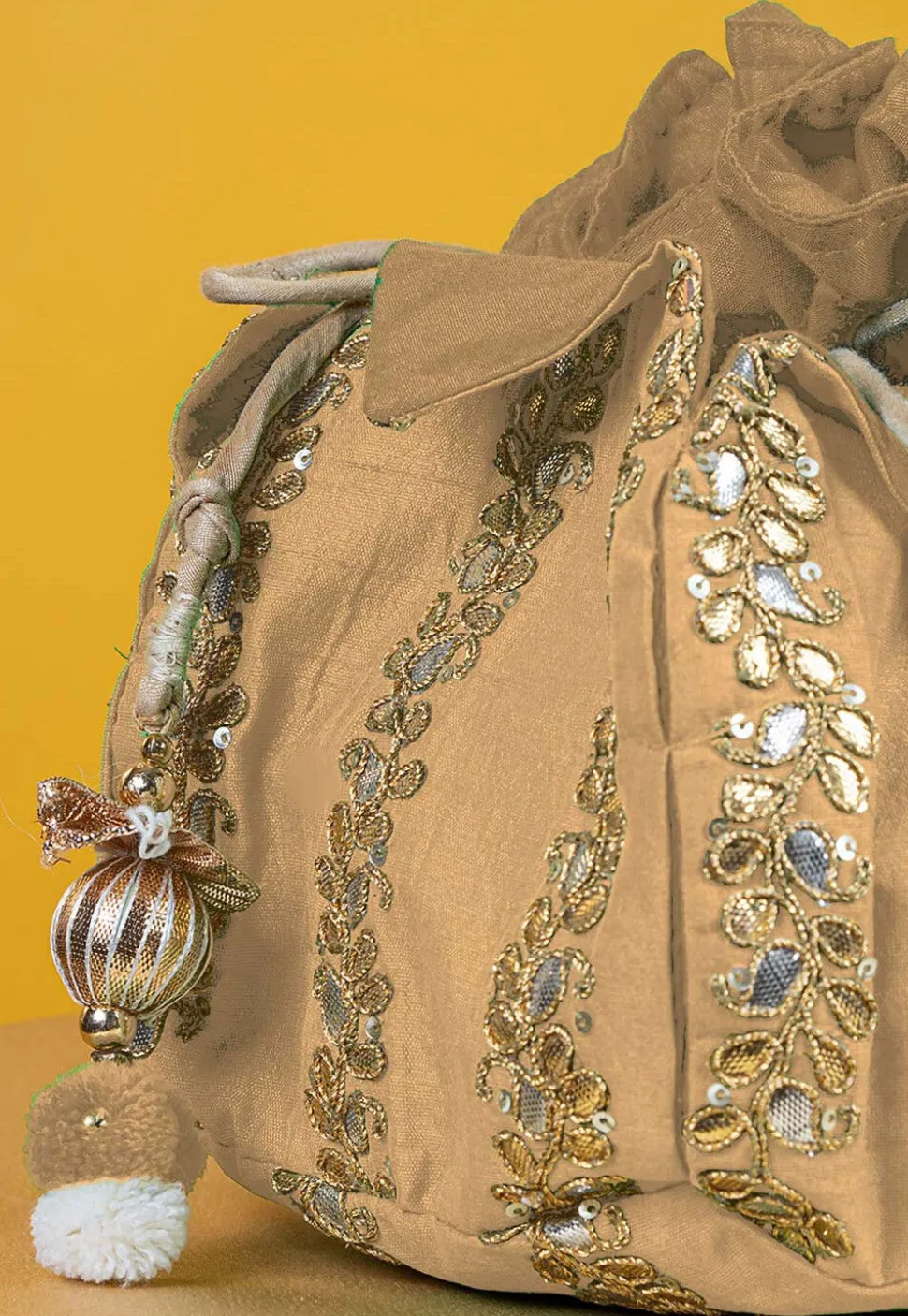 Gota Patti Art Silk Potli Bag in Beige