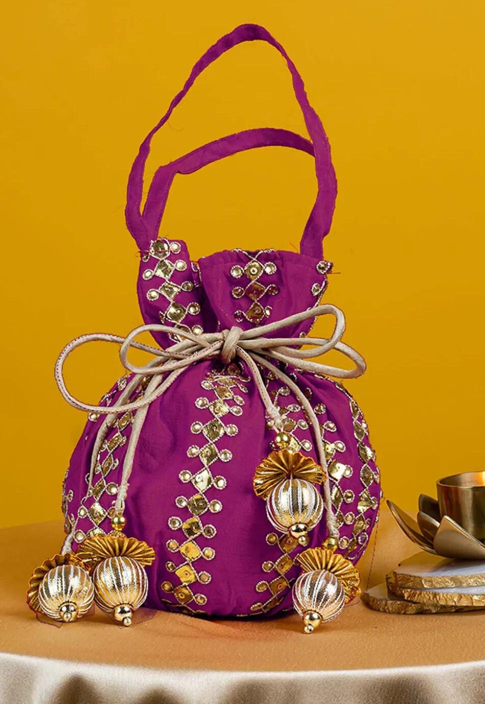 Gota Patti Art Silk Potli Bag in Magenta