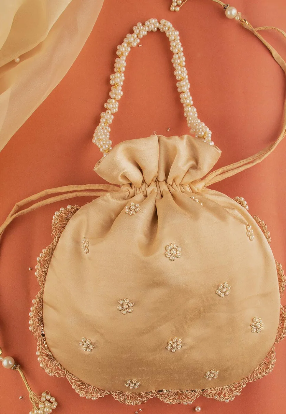 Hand Embroidered Art Silk Potli Bag in Beige