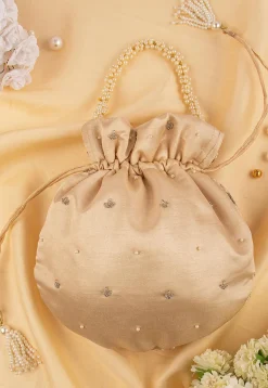 Hand Embroidered Art Silk Potli Bag in Beige