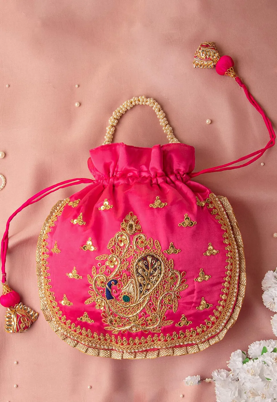 Hand Embroidered Art Silk Potli Bag in Fuchsia