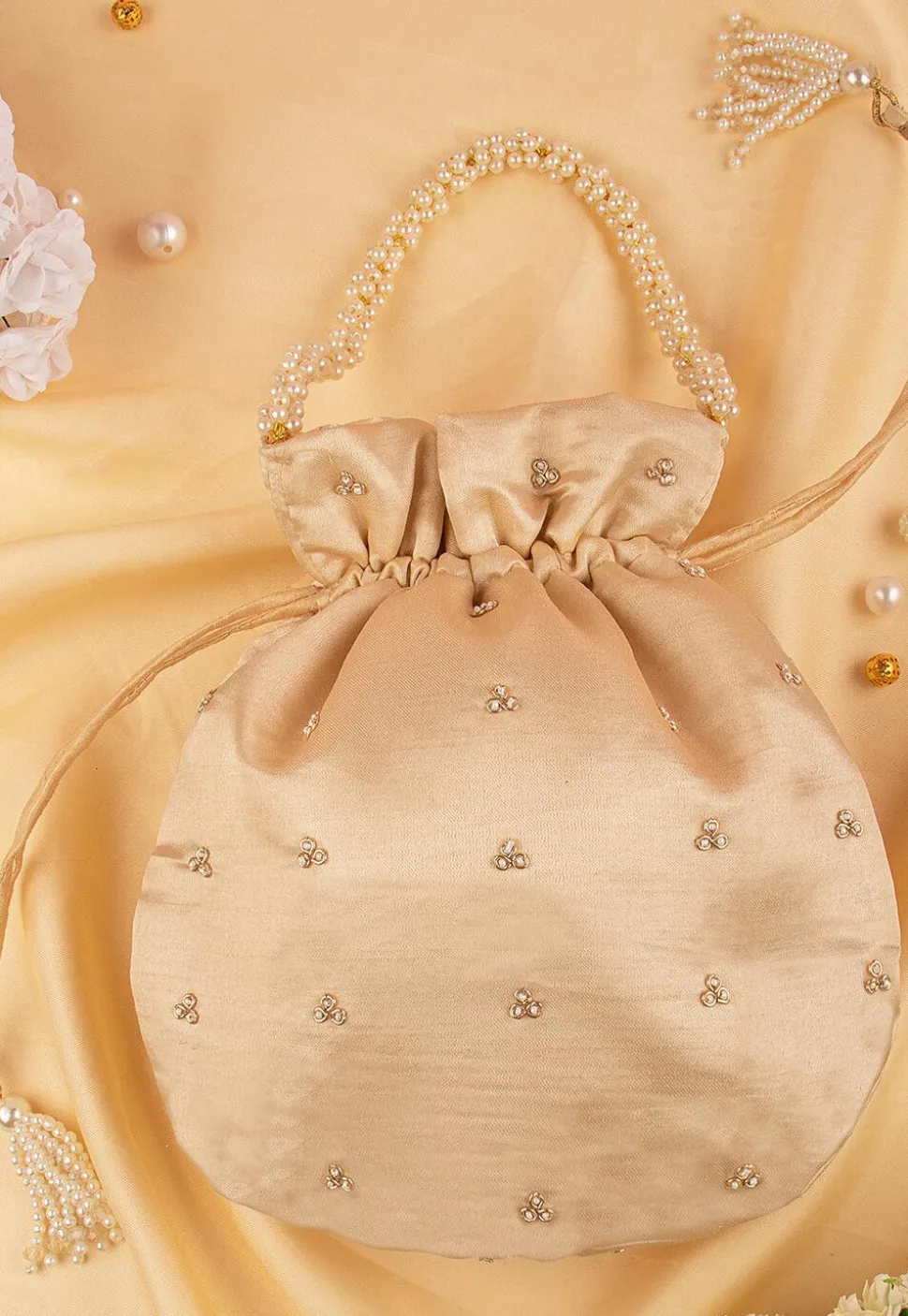 Hand Embroidered Art Silk Potli Bag in Beige