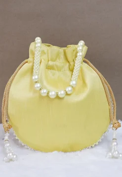 Hand Embroidered Art Silk Potli Bag in Pastel Yellow
