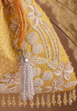 Hand Embroidered Art Silk Potli Bag in Mustard