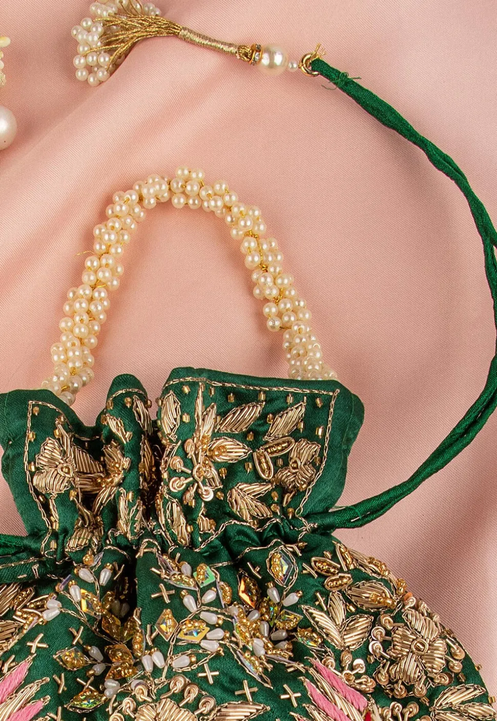 Hand Embroidered Art Silk Potli Bag in Dark Green