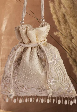 Hand Embroidered Art Silk Potli Bag in Cream
