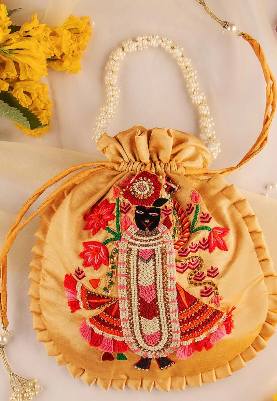 Hand Embroidered Art Silk Potli Bag in Beige