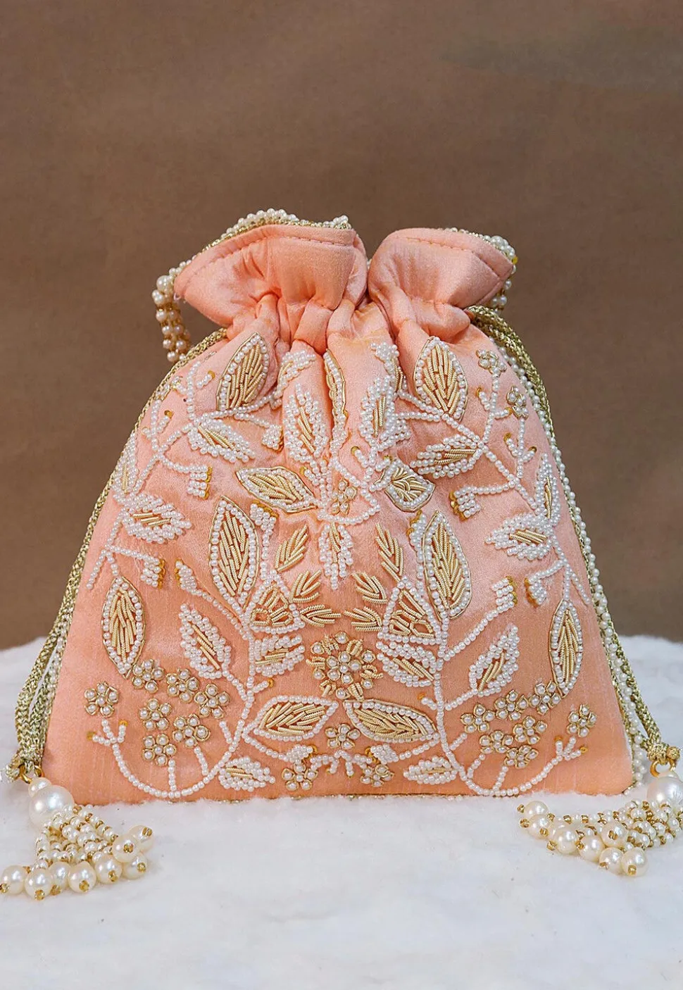 Hand Embroidered Art Silk Potli Bag in Peach