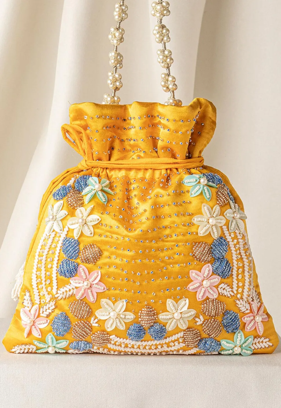 Hand Embroidered Art Silk Potli Bag in Yellow