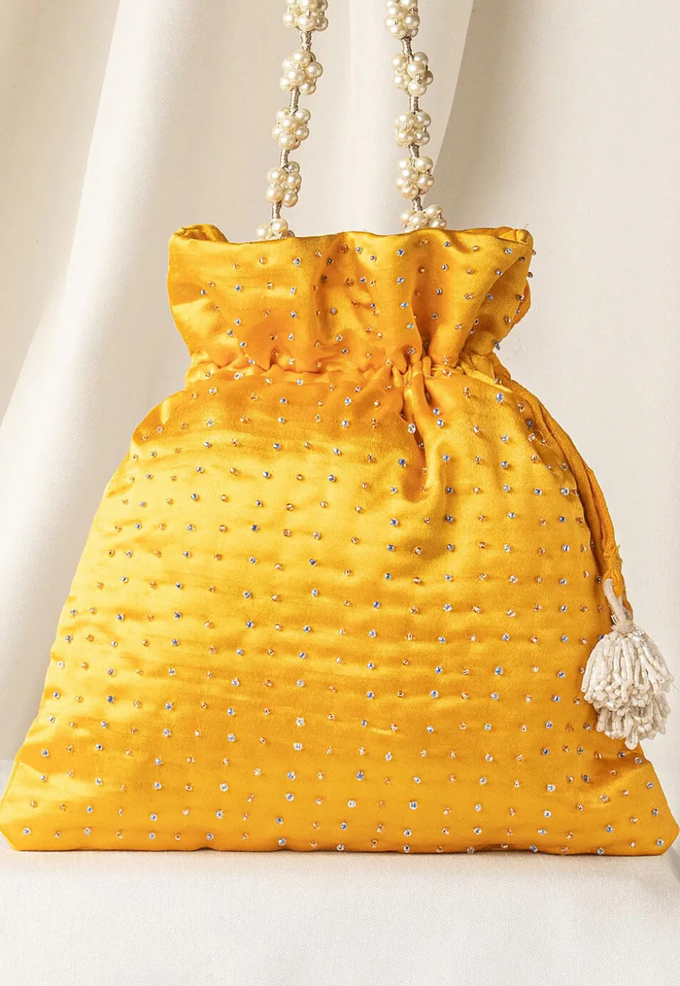 Hand Embroidered Art Silk Potli Bag in Yellow