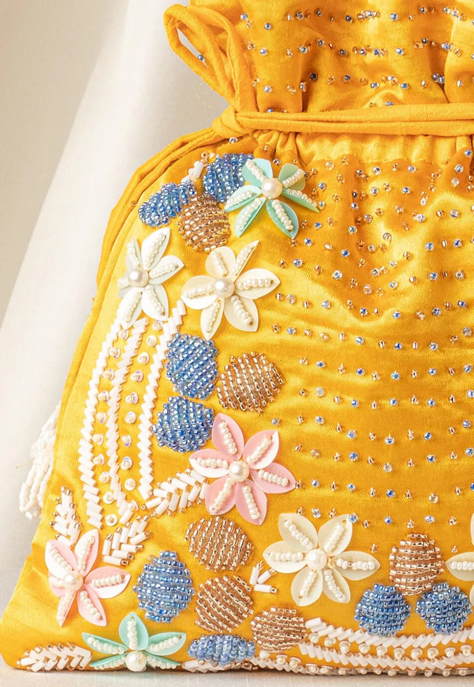 Hand Embroidered Art Silk Potli Bag in Yellow