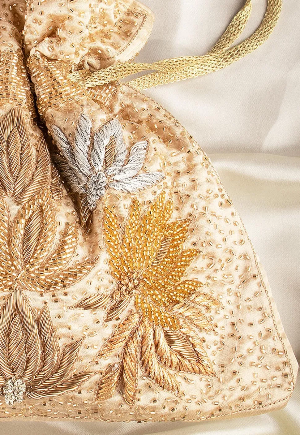 Hand Embroidered Art Silk Potli Bag in Beige